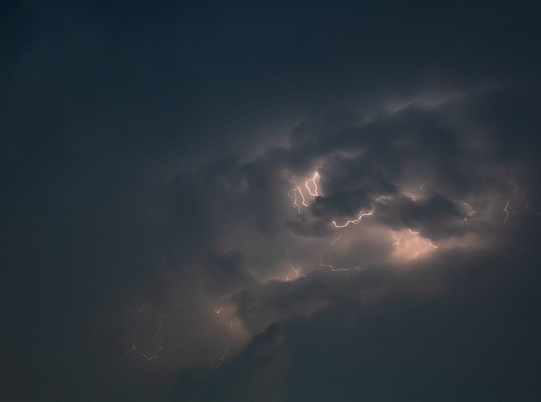 Captivating lightning illuminating a dark stormy sky, showcasing nature's power.